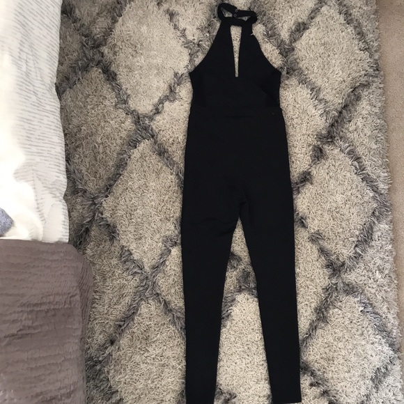 Black Halter Jumpsuit with Sheer Details - Picture 7 of 9